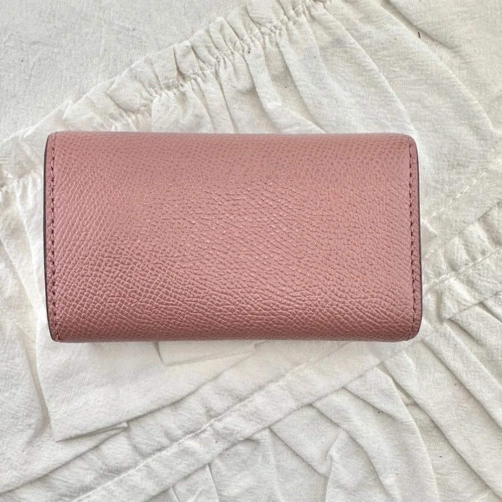 Preowned Coach key holder. Pink.